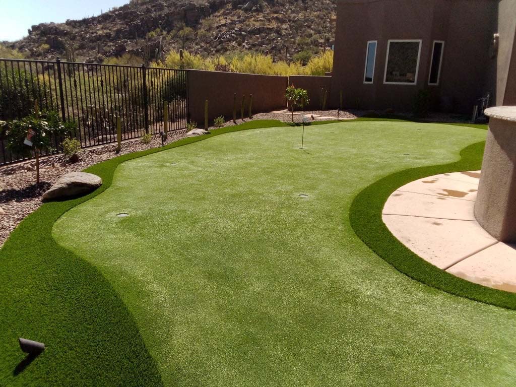 Completed residential synthetic grass installation by Arizona Luxury Lawns & Greens in Tucson AZ